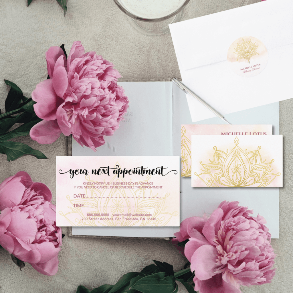 a display of business cards and stickers with a common theme, light rose watercolor background and a gold lotus mandala.