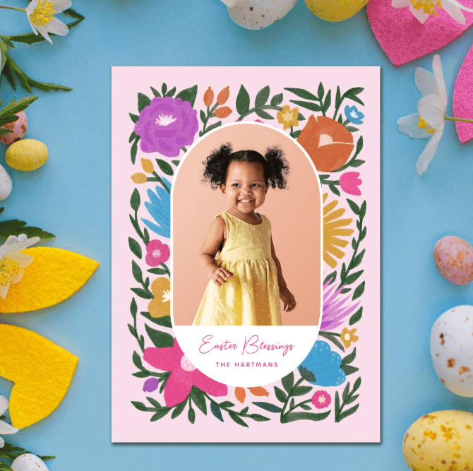 Happy Easter Photo Greetings Card featuring a colorful floral wreath with a customizable photo and text.